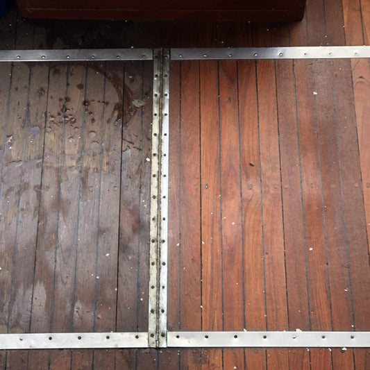 TotalBoat 2-Part Teak Wood Cleaner and Brightening System before and after on a boat
