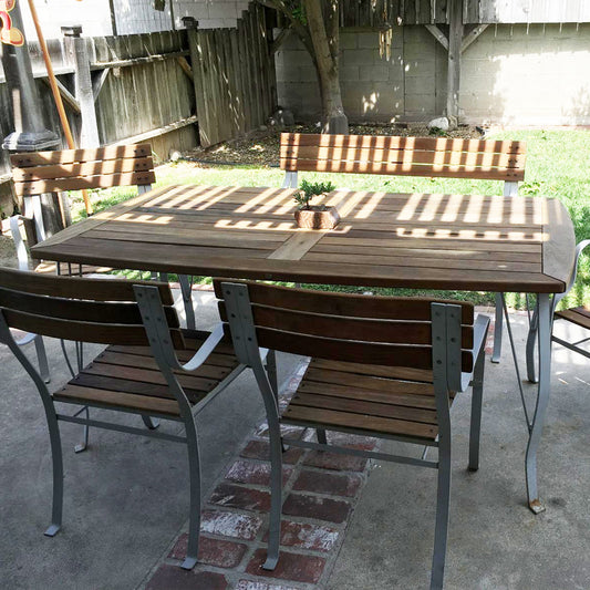 TotalBoat Teak Oil used on an outdoor dining set