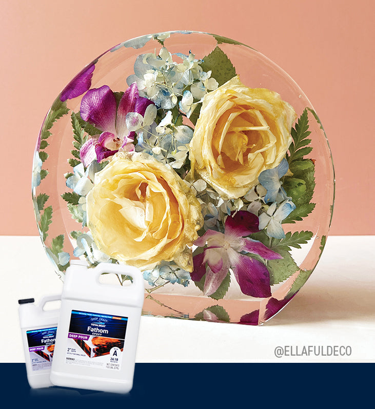 A crystal clear floral casting created by @ellafuldeco using TotalBoat Fathom Deep Pour Epoxy.