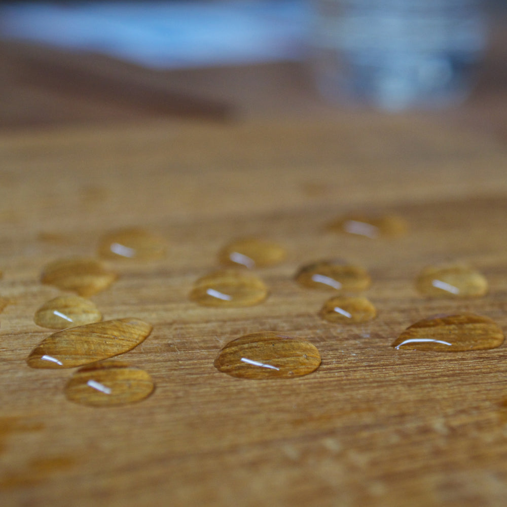 TotalBoat Danish Teak Sealer on wood, water beading up