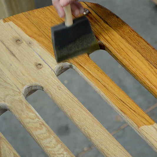 TotalBoat Teak Oil being applied with a foam brush